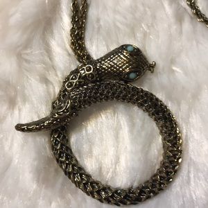 SNAKE NECKLACE WITH CLEAR BLUE EYES